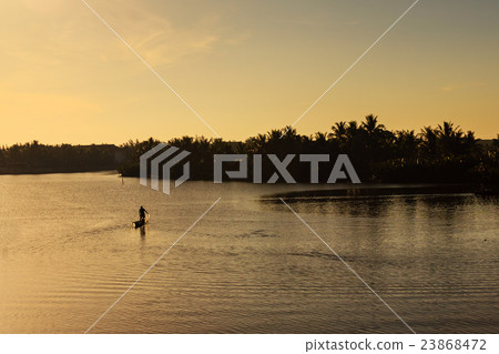 Fisherman is fishing in sunrise at Thu Bon river Fisherman is fishing in sunrise at Thu Bon river 23868472