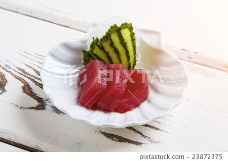 Slices of cucumber and meat. 23872375
