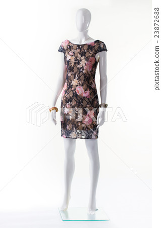 Floral evening dress on mannequin. 23872688