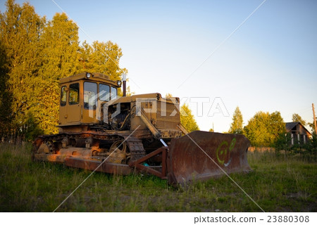 Old abandoned Russian rusty tractor Old abandoned Russian rusty tractor 23880308