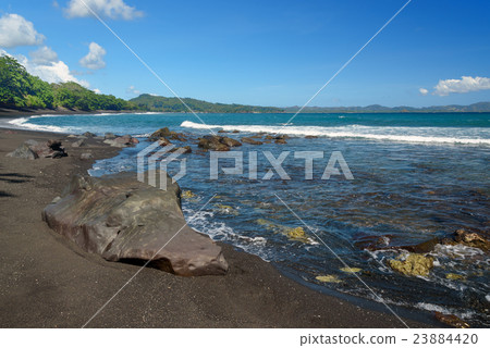 Black sand volcanic beach Black sand volcanic beach 23884420