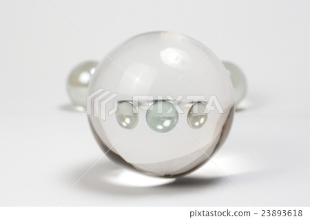 Clear Marbles through Crystal Ball 23893618