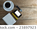 Black coffee with notebook,smartphone 23897923