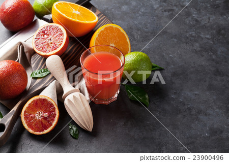 Fresh citruses and juice 23900496