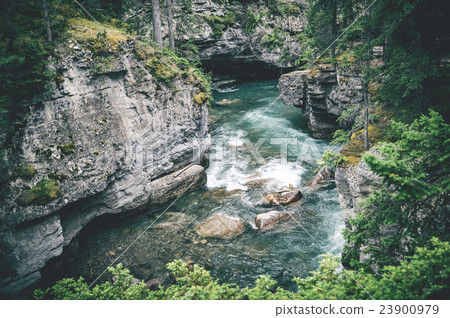 Wild river stream among cliffs and rocks 23900979