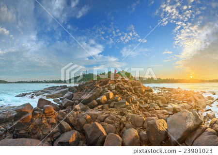 Romantic untouched tropical beach on sunset 23901023