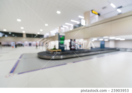 Blurred background of baggage claim belt area Blurred background of baggage claim belt area 23903953