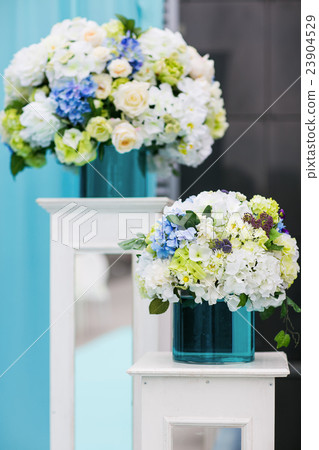 White bouquet made of peonies lies on the blue White bouquet made of peonies lies on the blue 23904529