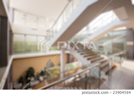 Blurred bokeh photo of stairs in office indoor Blurred bokeh photo of stairs in office indoor 23904584