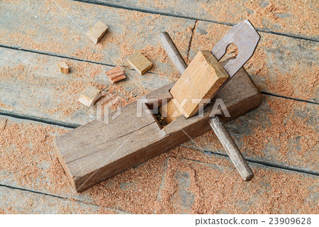 Old wooden carpenter hand plane on wooden. Old wooden carpenter hand plane on wooden. 23909628