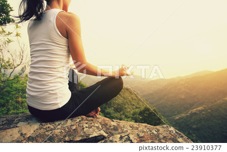 young fitness yoga woman at mountain peak young fitness yoga woman at mountain peak 23910377