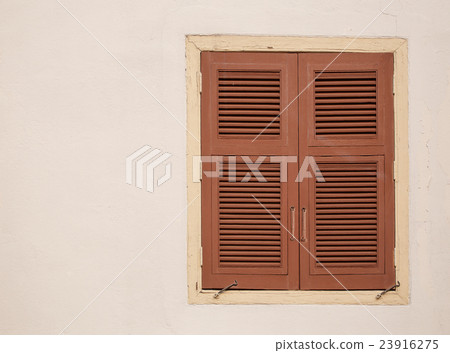 Wood windows on the white wall Wood windows on the white wall 23916275