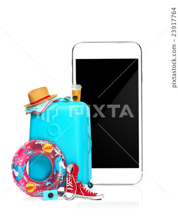 The blue suitcase, sneakers, clothing, hat, and 23917764