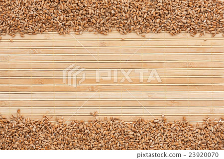 wheat on a bamboo mat wheat on a bamboo mat 23920070