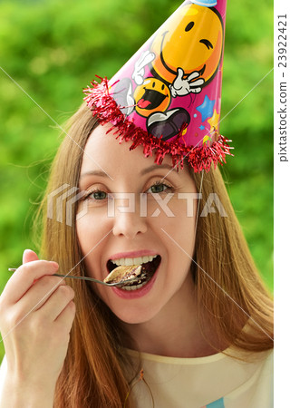 girl in a celebratory cap girl in a celebratory cap 23922421