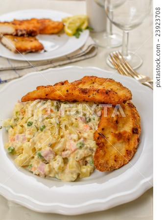 Wiener schnitzel with potato salad 23923708