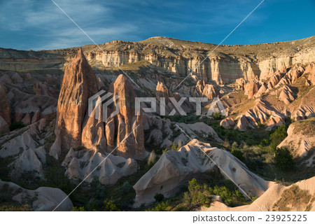 landscape with rock formations in Cappadocia landscape with rock formations in Cappadocia 23925225