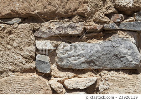 Wall from large stone textured basalt. Wall from large stone textured basalt. 23926119