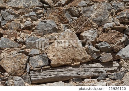 Wall from large stone textured basalt. Wall from large stone textured basalt. 23926120