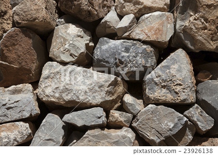 Wall from large stone textured basalt. 23926138