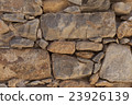 Wall from large stone textured basalt.  23926139