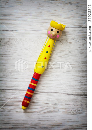 Colorful childish funny pen on the wooden texture Colorful childish funny pen on the wooden texture 23928241