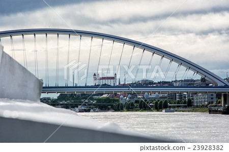 Bratislava castle behind modern Apollo bridge 23928382
