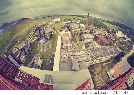An old abandoned coal mine in cloudy day. An old abandoned coal mine in cloudy day. 23931421