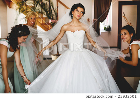 Stock Photo: The happinest bride with bridesmaids