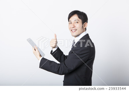 Businessmen using tablets 23933544