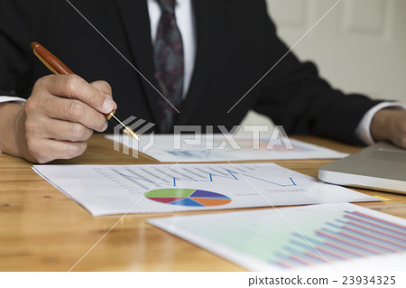 businessman working with document, laptop comp businessman working with document, laptop comp 23934325