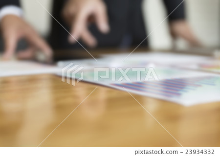 businessman analyzing with tablet and paperwork d businessman analyzing with tablet and paperwork d 23934332