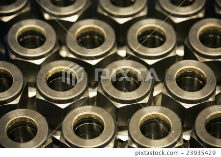 Old bolts or dirty bolts on wooden background 23935429