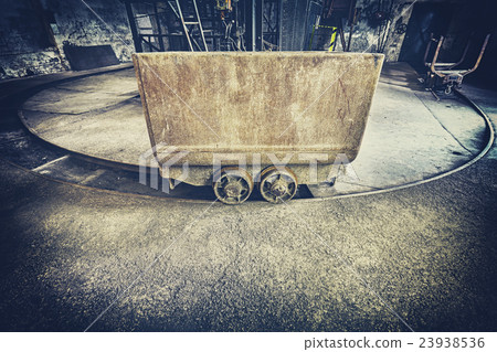 Retro toned old rusty mine cart. 23938536