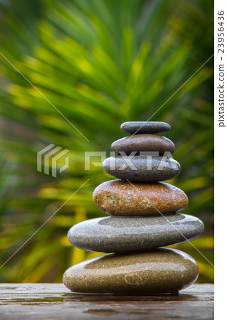 stack of round smooth wet pebbles stack of round smooth wet pebbles 23956436