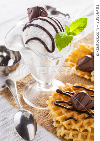 Ice Cream with chocolate candies, Mint and waffles 23956481