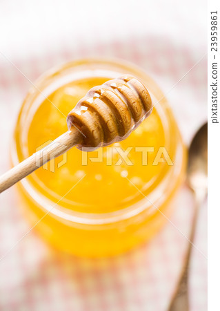 Wooden honey stick. Wooden honey stick. 23959861
