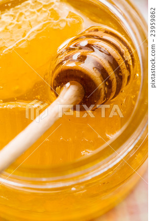 Wooden honey stick. 23959862