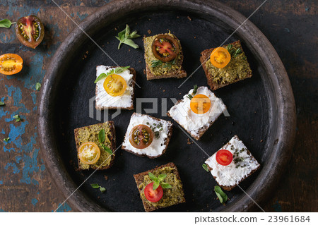 Small sandwiches with tomatoes Small sandwiches with tomatoes 23961684