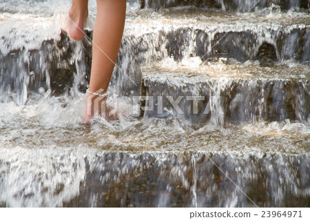 Playing in the water Playing in the water 23964971