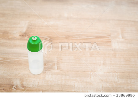High angle view of bottle on floor High angle view of bottle on floor 23969990
