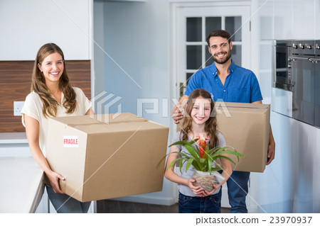 Portrait of family moving house 23970937