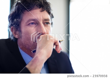 Thoughtful businessman in restaurant 23970938