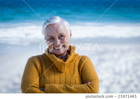 Senior woman posing with crossed arms Senior woman posing with crossed arms 23971465
