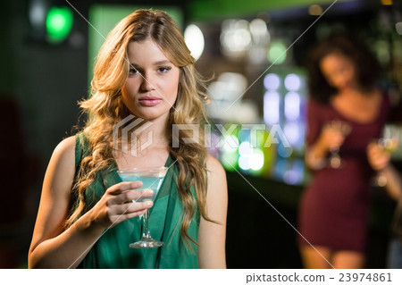 Portrait of smiling blonde woman 23974861