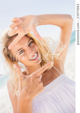 Woman making square with hands 23974863