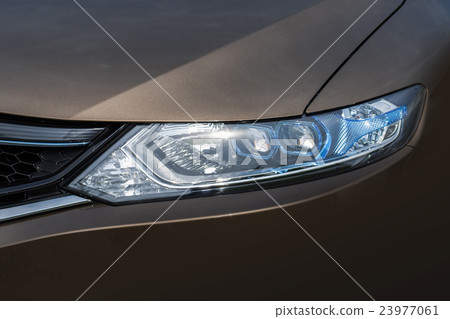 Headlight of the car 23977061