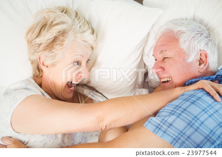 Overhead view of cheerful couple enjoying Overhead view of cheerful couple enjoying 23977544