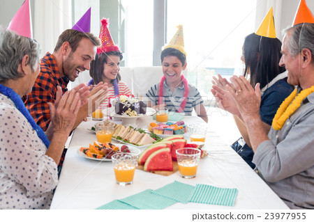Happy family celebrating a birthday 23977955