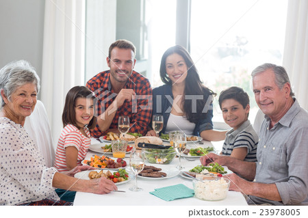 Family together having meal 23978005